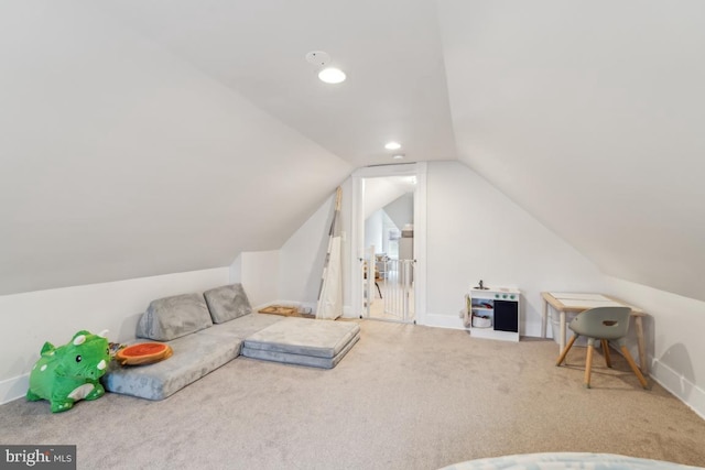 carpeted bedroom with lofted ceiling, baseboards, and recessed lighting