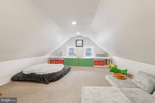 carpeted bedroom with vaulted ceiling and recessed lighting