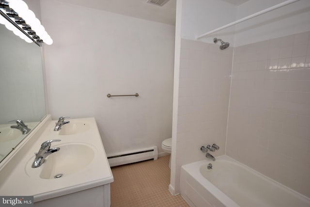 full bathroom featuring toilet, shower / bath combination, a baseboard radiator, and a sink