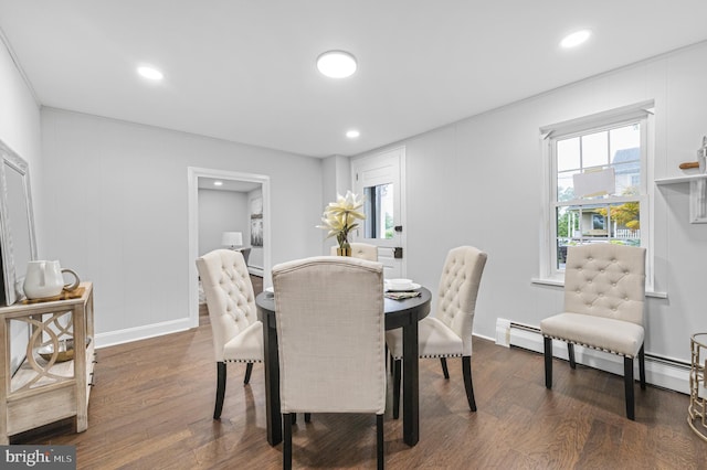 dining area featuring dark wood-style floors, recessed lighting, and baseboard heating