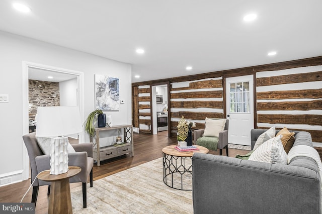 living room featuring wood finished floors and recessed lighting