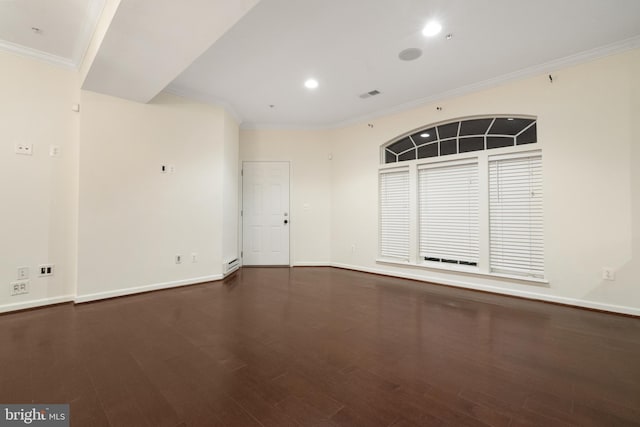 empty room with visible vents, baseboards, ornamental molding, recessed lighting, and wood finished floors