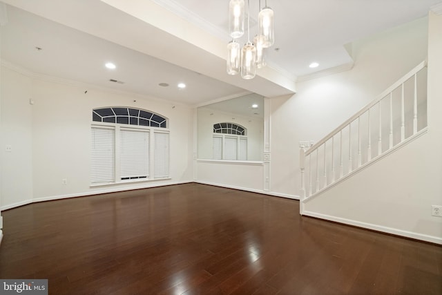 unfurnished living room with recessed lighting, baseboards, wood finished floors, and ornamental molding