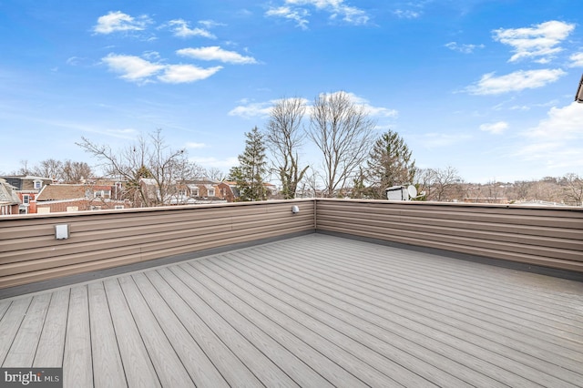 wooden deck featuring a residential view