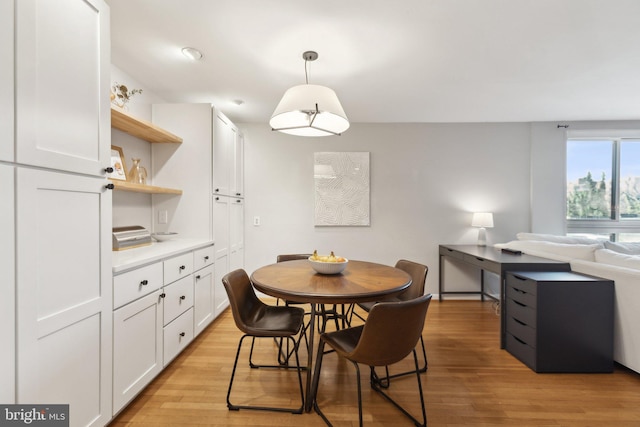 dining room with light wood finished floors