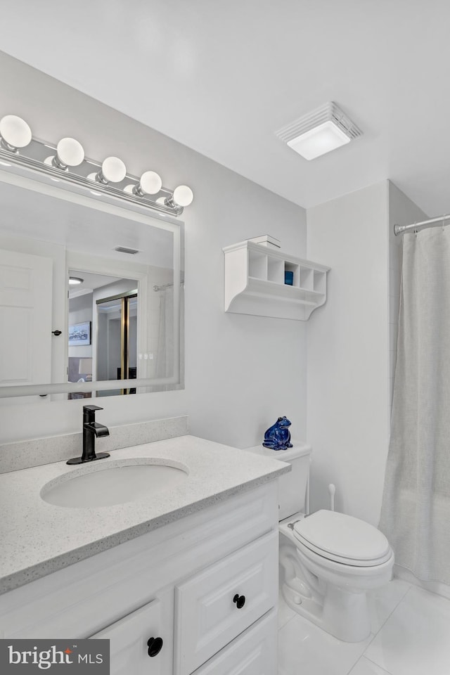 full bath with toilet, visible vents, and vanity