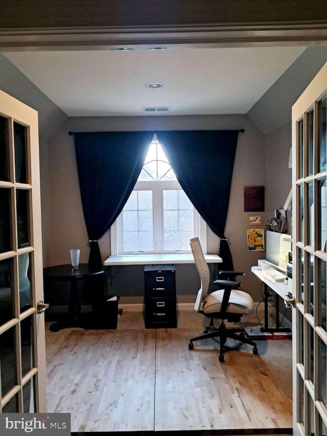 1392 Hickory Hill Rd, Chadds Ford, PA 19317 - office featuring lofted ceiling, visible vents, wood finished floors, and french doors