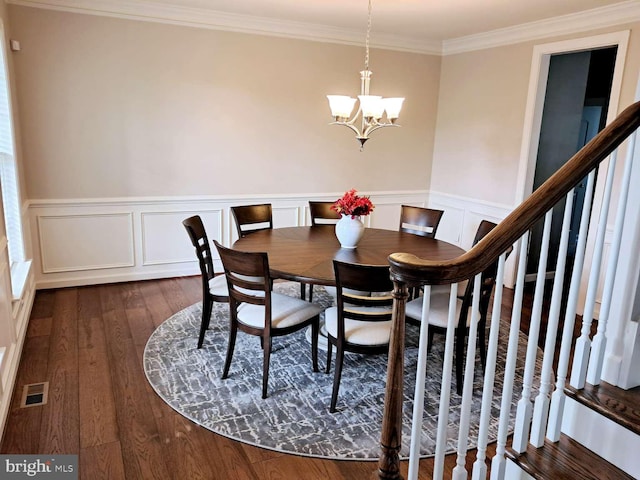 1392 Hickory Hill Rd, Chadds Ford, PA 19317 - dining area with crown molding, dark wood finished floors, visible vents, stairway, and an inviting chandelier