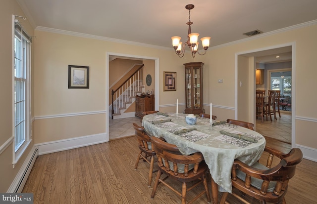 dining space featuring visible vents, stairs, wood finished floors, a notable chandelier, and a baseboard radiator