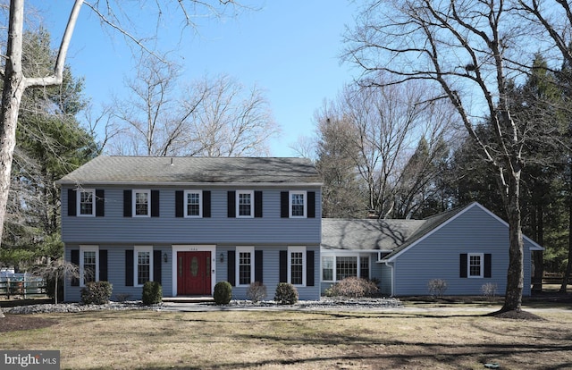 colonial house with a front yard