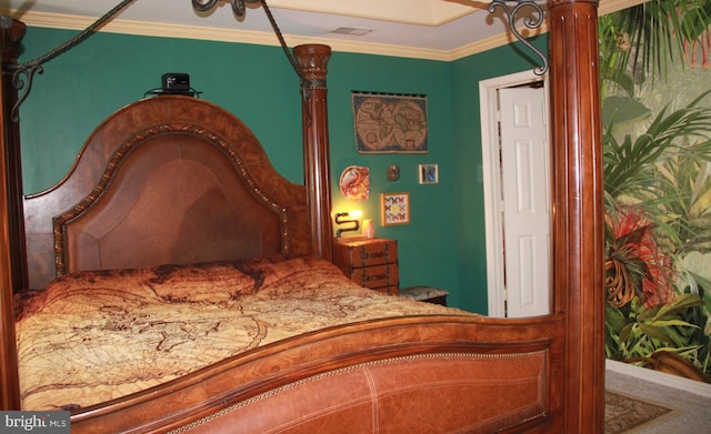 bedroom featuring ornamental molding