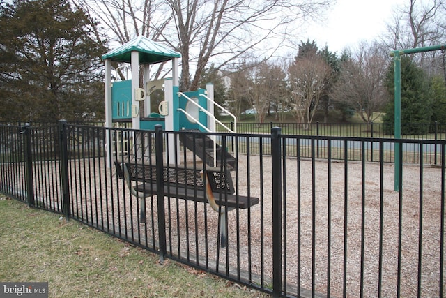 view of gate featuring fence