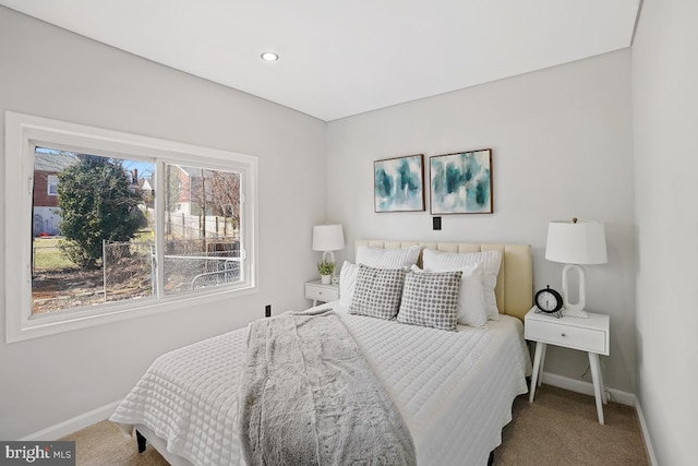 bedroom featuring recessed lighting, carpet flooring, and baseboards