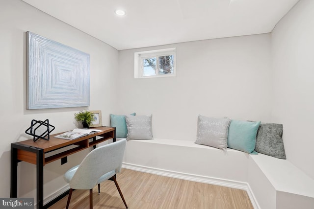 office space with wood finished floors and recessed lighting