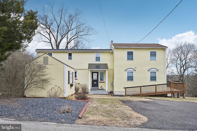 view of front of house featuring a wooden deck