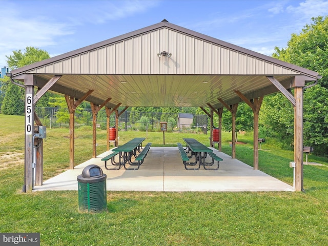 view of home's community with a patio area