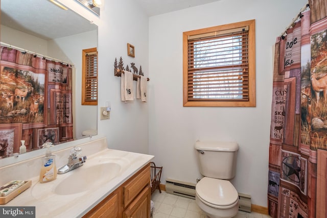 bathroom featuring toilet, baseboards, a baseboard heating unit, and vanity