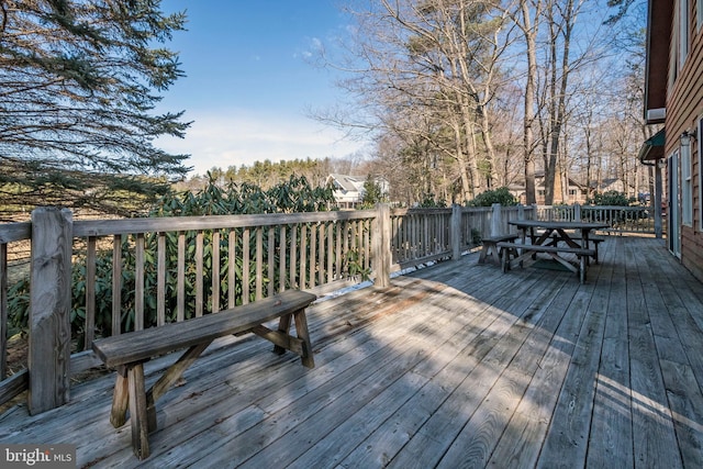 deck featuring outdoor dining space