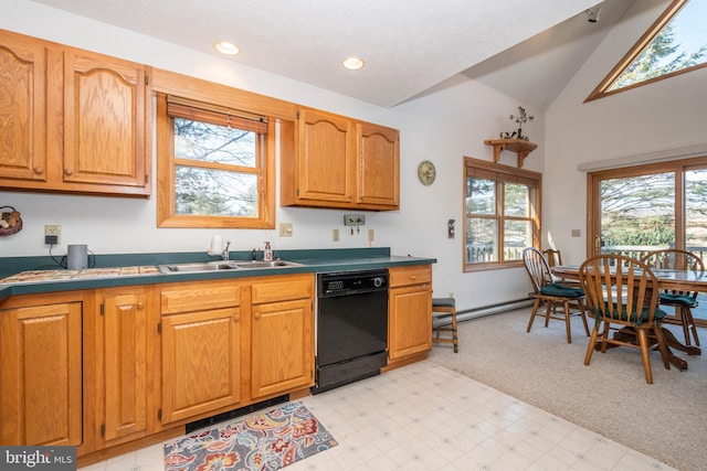 kitchen with black dishwasher, light floors, a baseboard radiator, recessed lighting, and a sink