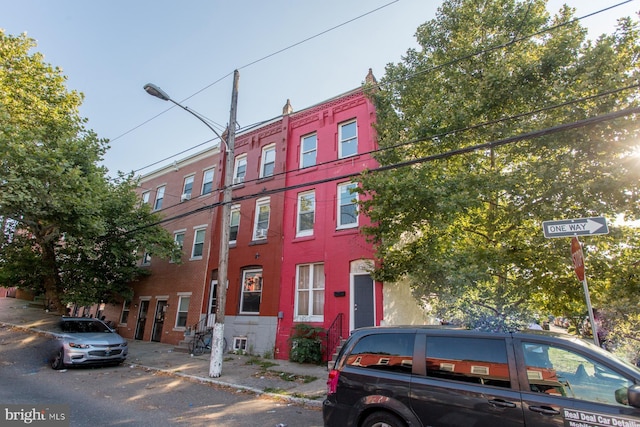 view of front of home featuring brick siding