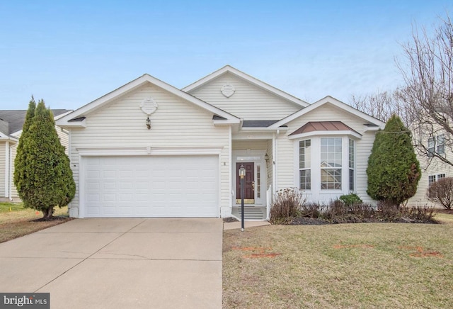 single story home with a garage, concrete driveway, and a front lawn