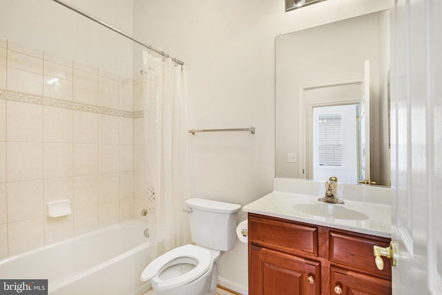 bathroom featuring vanity, toilet, and shower / bathtub combination with curtain