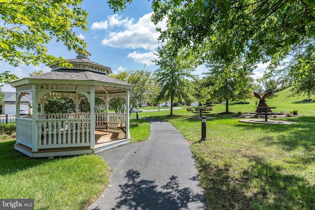 view of community with a yard and a gazebo