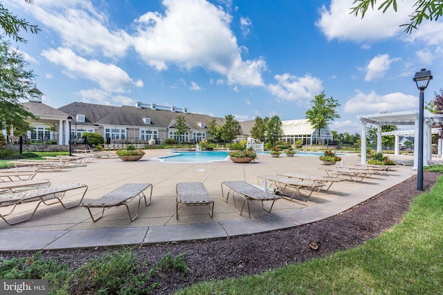 community pool featuring a patio and a pergola