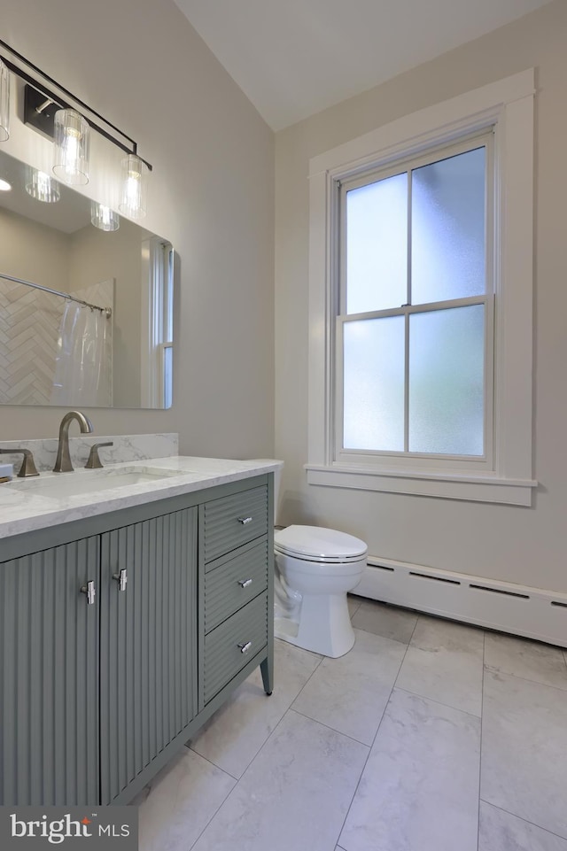 full bathroom with vanity, toilet, a shower with curtain, and baseboard heating