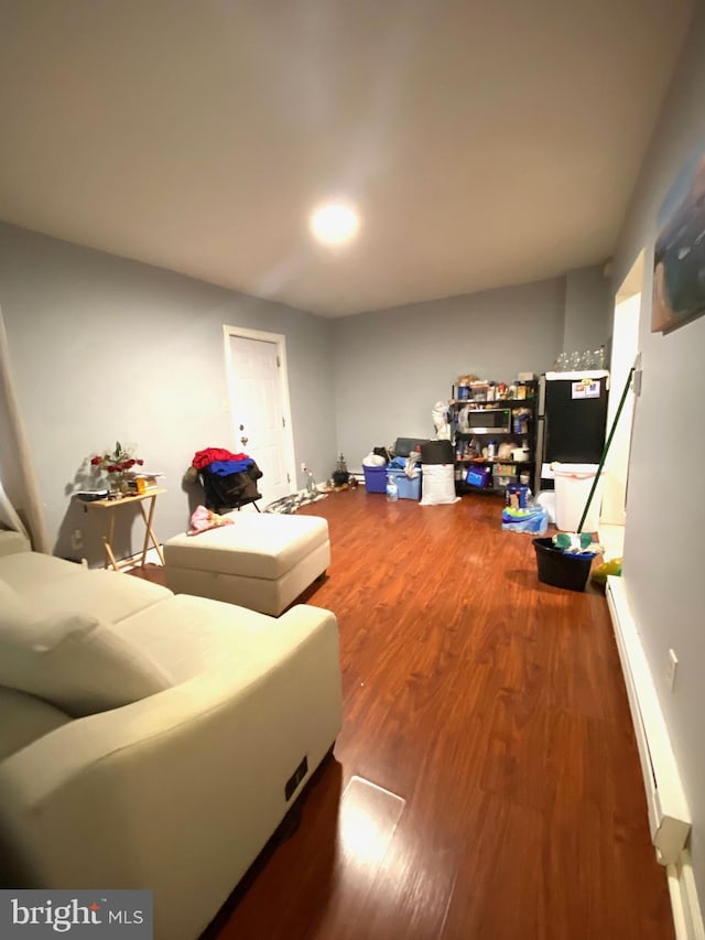 living room with wood finished floors