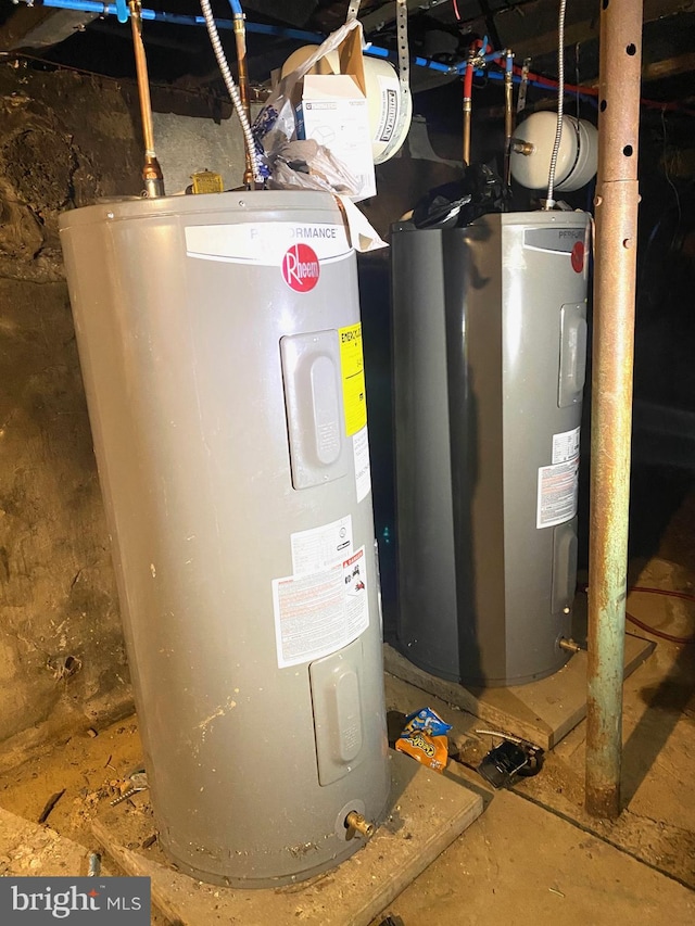 utility room featuring water heater