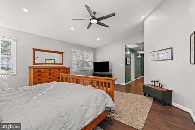 bedroom with recessed lighting, vaulted ceiling, baseboards, and wood finished floors