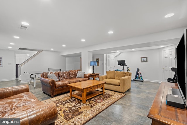 living area featuring baseboards, stairs, visible vents, and recessed lighting