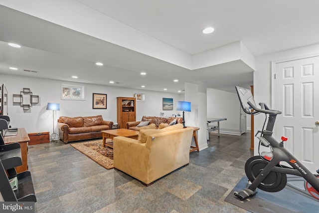 living room with baseboards, visible vents, and recessed lighting