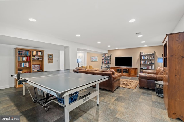 game room with recessed lighting, stone finish floor, visible vents, and baseboards