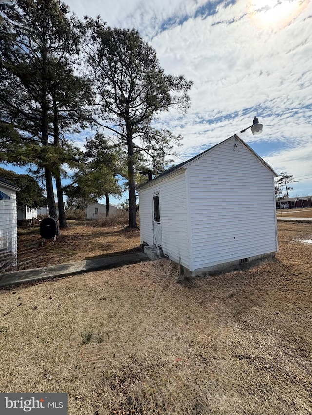 view of home's exterior with crawl space