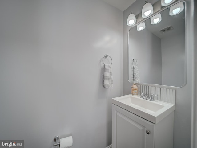 bathroom featuring vanity and visible vents