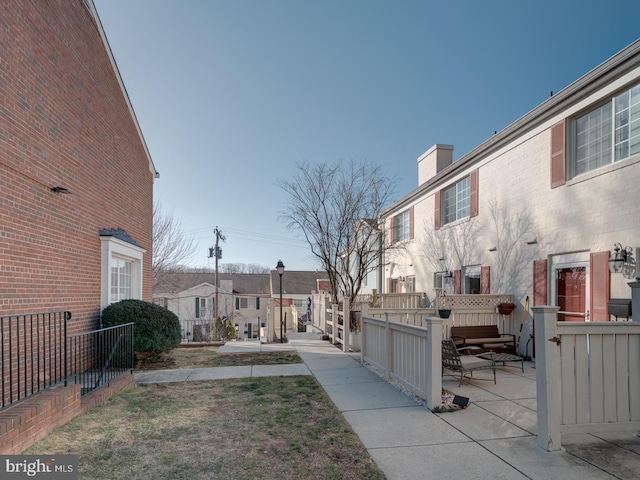 view of yard with a patio area and fence