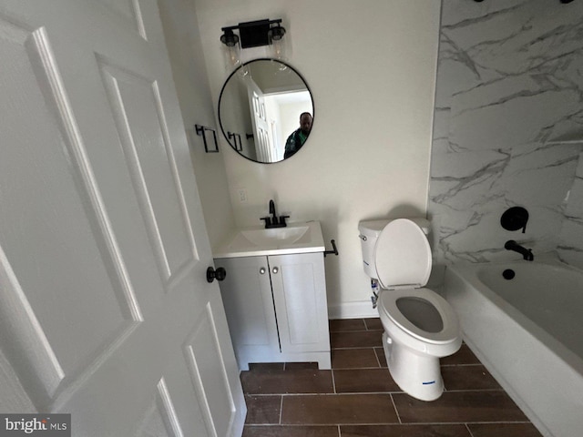 full bathroom with shower / bathtub combination, toilet, wood finish floors, vanity, and baseboards