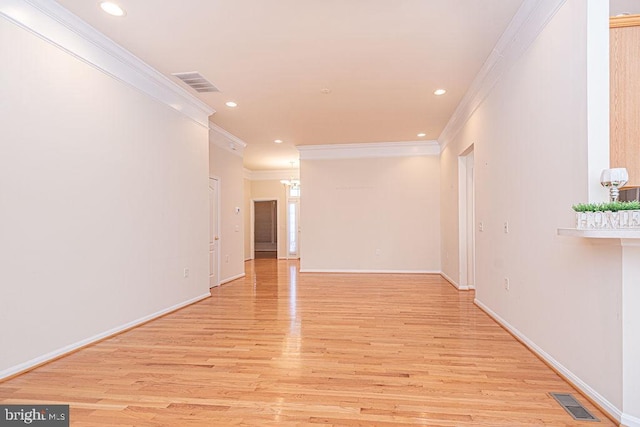 unfurnished room with light wood-style flooring, visible vents, and recessed lighting