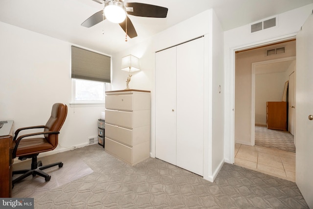 home office with ceiling fan and visible vents