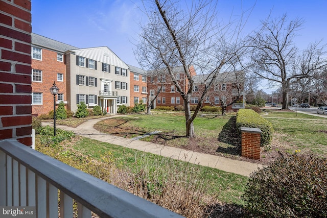 surrounding community featuring a lawn