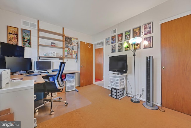 carpeted office featuring visible vents