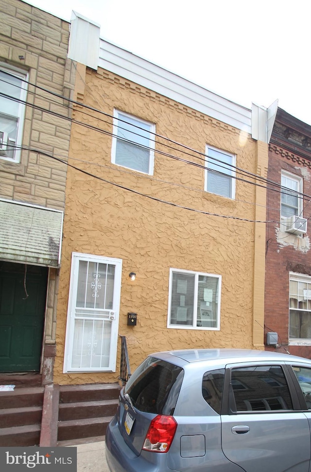 view of building exterior featuring entry steps