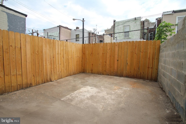 exterior space with a patio and fence