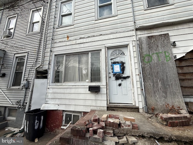 entrance to property with cooling unit