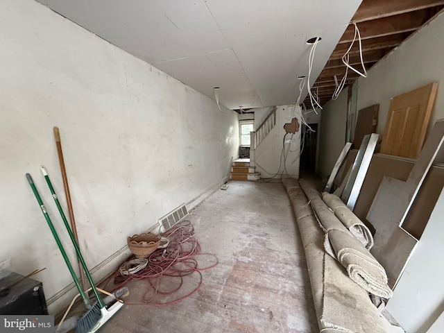 interior space with visible vents and stairs