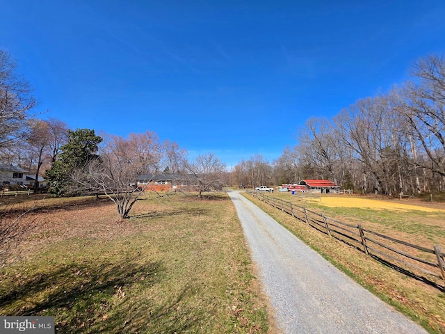 view of street featuring a rural view and driveway