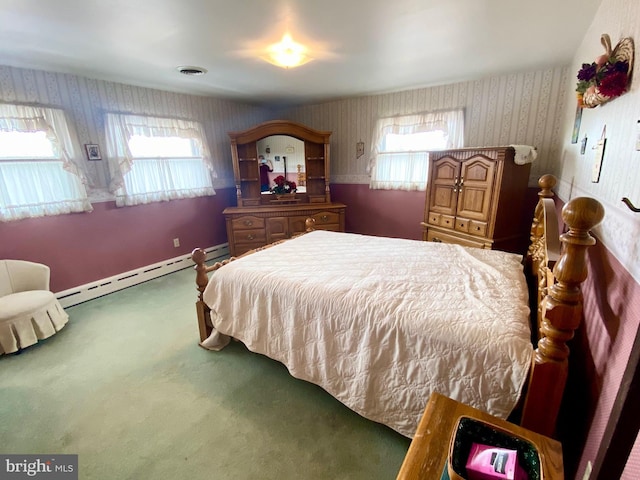 bedroom featuring carpet floors, a baseboard radiator, visible vents, multiple windows, and wallpapered walls