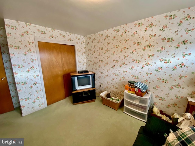 playroom featuring carpet and wallpapered walls